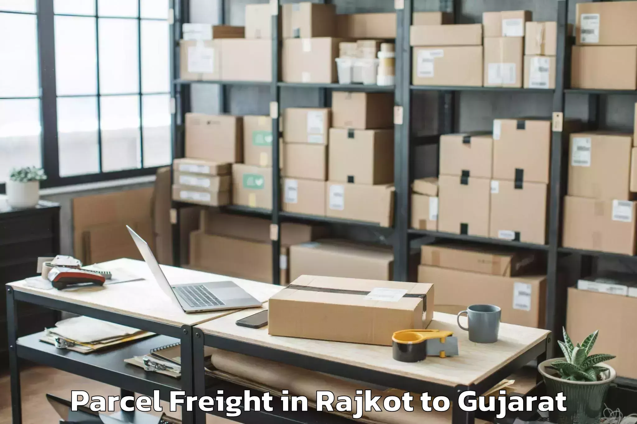 Get Rajkot to Unjha Parcel Freight